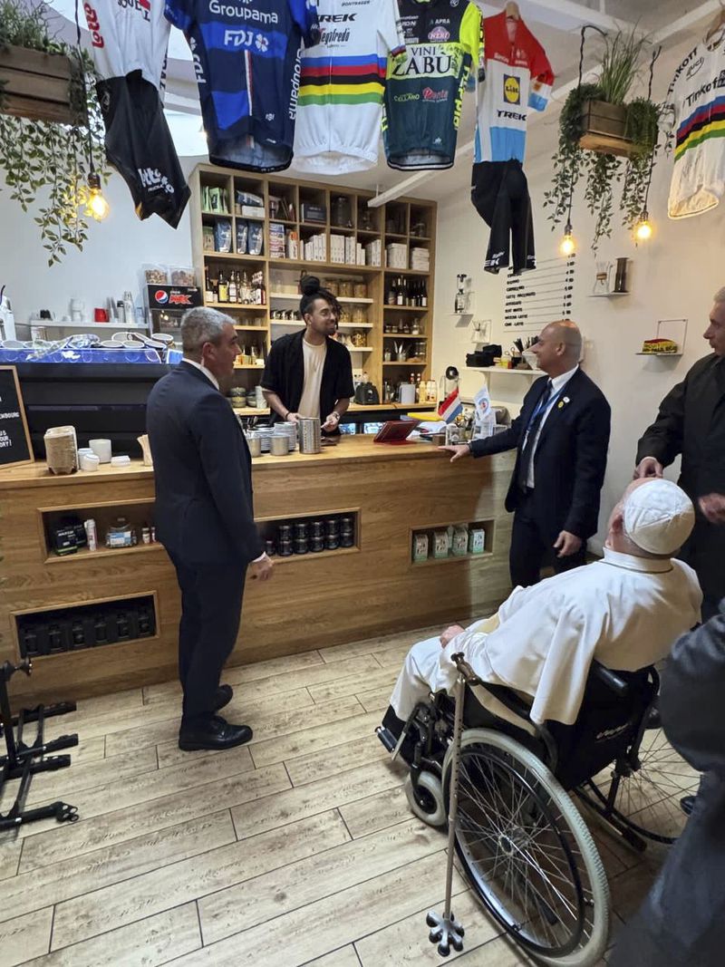 Pope Francis arrives after lunch to a bar near the archbishop's residence in Luxembourg for a coffee on the first day of his four-day visit to Luxembourg and Belgium, Thursday, Sept. 26, 2024. (Sala Stampa della Santa Sede via AP)