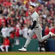 Detroit Tigers' Kerry Carpenter celebrates as he runs the bases with a three-run home run in the ninth inning during Game 2 of baseball's AL Division Series against the Cleveland Guardians, Monday, Oct. 7, 2024, in Cleveland. (AP Photo/David Dermer)