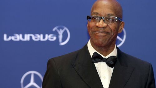 FILE - In this April 18, 2016, file photo, Edwin Moses poses for photos as he arrives for the Laureus World Sports Awards in Berlin, Germany. Three months after suffering the second of two traumatic head injuries in the span of six weeks, Edwin Moses is nearing 100 percent again. It's been an amazing recovery for one of America's best-known Olympic stars, and a man who is no stranger to making the impossible seem possible. (AP Photo/Markus Schreiber, File)