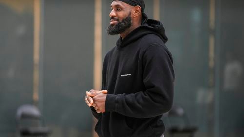 Los Angeles Lakers' LeBron James attends a news conference held to introduce the team's draft picks, his son, Bronny James and Dalton Knecht, in El Segundo, Calif., Tuesday, July 2, 2024. (AP Photo/Damian Dovarganes)