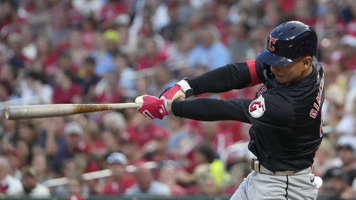 Cleveland Guardians' Andres Gimenez singles during the second inning of a baseball game against the St. Louis Cardinals Saturday, Sept. 21, 2024, in St. Louis. (AP Photo/Jeff Roberson)