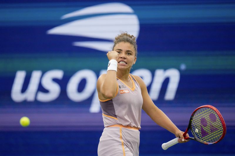 Jasmine Paolini, of Italy, reacts after scoring a point against Yulia Putintseva, of Kazakhstan, of the United States, during the third round of the U.S. Open tennis championships, Saturday, Aug. 31, 2024, in New York. (AP Photo/Julia Nikhinson)