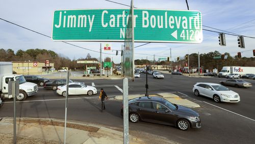 A Jimmy Carter Boulevard sign is shown at it’s intersection with Lawrenceville Highway on Monday, Feb. 20, 2023, in Norcross, Ga.. Former President Jimmy Carter, the Georgia native who is the longest living president in U.S. history, has decided against any further medical treatment and has entered home hospice care, the Carter Center said Saturday. “After a series of short hospital stays, former U.S. President Jimmy Carter decided to spend his remaining time at home with his family and receive hospice care instead of additional medical intervention,” the Atlanta-based center said. Jason Getz / Jason.Getz@ajc.com)
