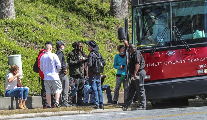 I-85 shut down as Gwinnett SWAT surrounds bus with armed man aboard