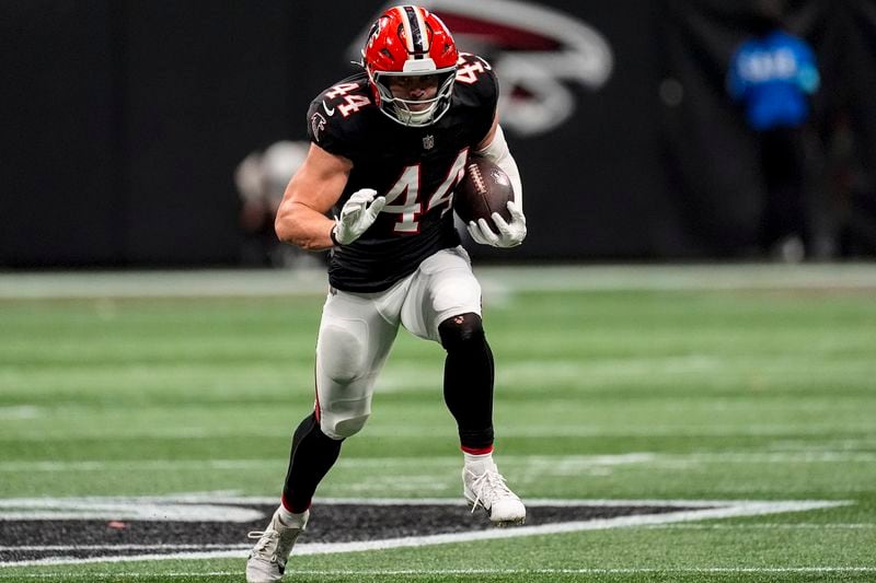 Atlanta Falcons linebacker Troy Andersen (44) runs into the end zone on an interception against the New Orleans Saints during the first half of an NFL football game, Sunday, Sept. 29, 2024, in Atlanta. (AP Photo/John Bazemore)