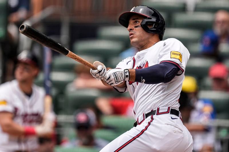 Atlanta Braves' Ramón Laureano (18) hits a solo homer in the fourth inning of a baseball game against the Detroit Tigers, Wednesday, June 19, 2024, in Atlanta. (AP Photo/Mike Stewart)