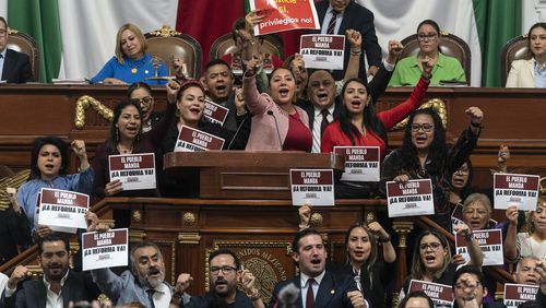 Mexico City lawmakers rally in favor of judicial reform at the city Congress in Mexico City, Thursday, Sept. 12, 2024. (AP Photo/Felix Marquez)