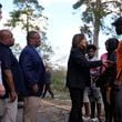 Democratic presidential nominee Vice President Kamala Harris greets people who were impacted by Hurricane Helene in Augusta, Ga., Wednesday, Oct. 2, 2024, as from left, Sen. Jon Ossoff, D-Ga., FEMA deputy direct Erik Hooks and Augusta Mayor Garnett Johnson watch. (AP Photo/Carolyn Kaster)