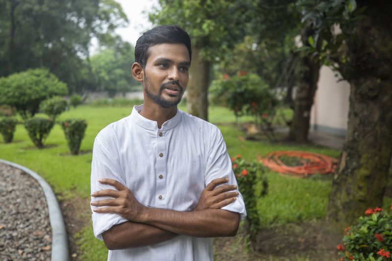 FILE - Asif Mahmud, a student protest leader who is now in charge of the Sports and Youth Ministry in the interim government, talks in Dhaka, Bangladesh, on Aug.11, 2024. (AP Photo/Rajib Dhar, File)