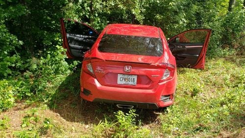 A car chase through Paulding County on Monday afternoon led to the arrests of four people, including three wanted in a May shooting outside a Buckhead Home Depot.