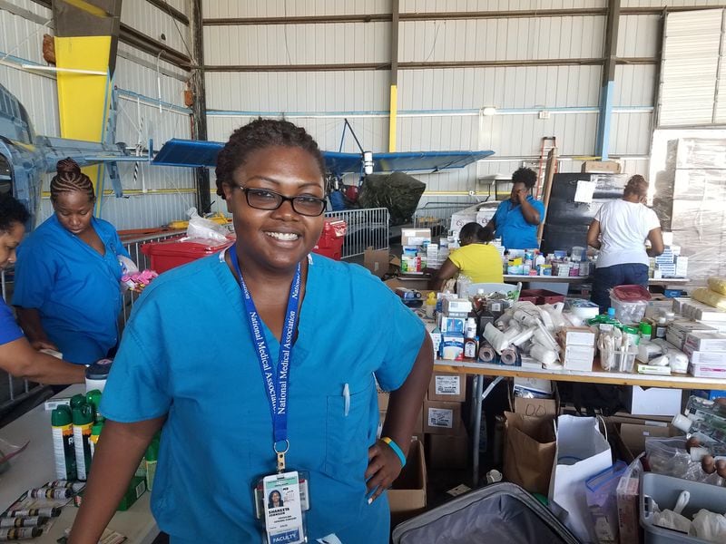 Dr. Shaneeta Johnson joins volunteers from the U.S. and Bahamas to distribute needed medical supplies from a Nassau airport hangar and makeshift clinic. CONTRIBUTED