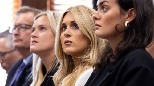 (From third left) Former collegiate swimmers Kaitlynn Wheeler, Riley Gaines, and Grace Countie, who competed in Georgia but aren’t from the state, prepare to testify in opposition to transgender athletes in women's sports in front of the state senate’s Special Committee on Protecting Women's Sports at the Capitol in Atlanta on Tuesday, August 27, 2024. (Arvin Temkar / AJC)