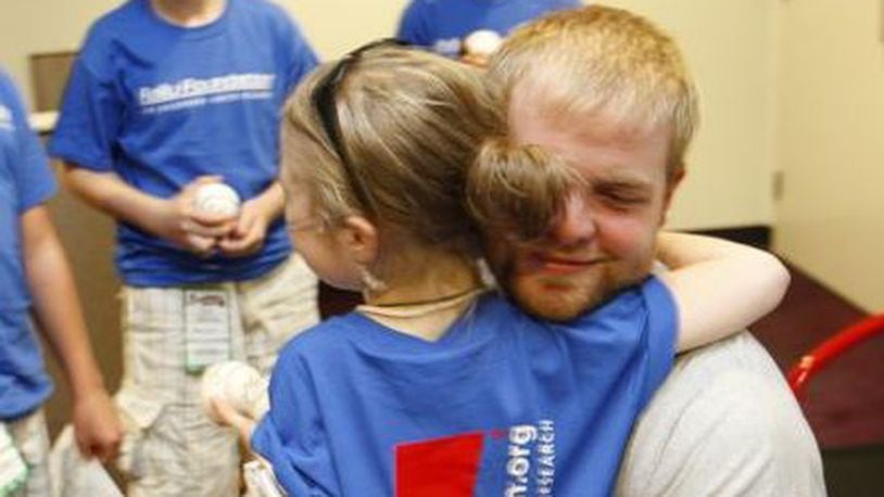 BRIAN MCCANN HOSTS CHILDREN FIGHTING CANCER AT ATLANTA BRAVES GAME