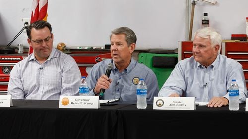 Gov. Brian Kemp speaks to state lawmakers and small business leaders during a roundtable discussion on civil litigation policies impacting the state's business climate at Samson Tours headquarters in Atlanta on Thursday, Aug. 22, 2024. (Natrice Miller/ AJC)