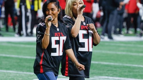 T-Boz And Chilli were on hand as the Atlanta Falcons celebrated Hip-Hop 50 with performances and appearances during the game between the Atlanta Falcons and the New Orleans Saints in Atlanta on Sunday, Nov. 26, 2023.   (Bob Andres for the Atlanta Journal Constitution)