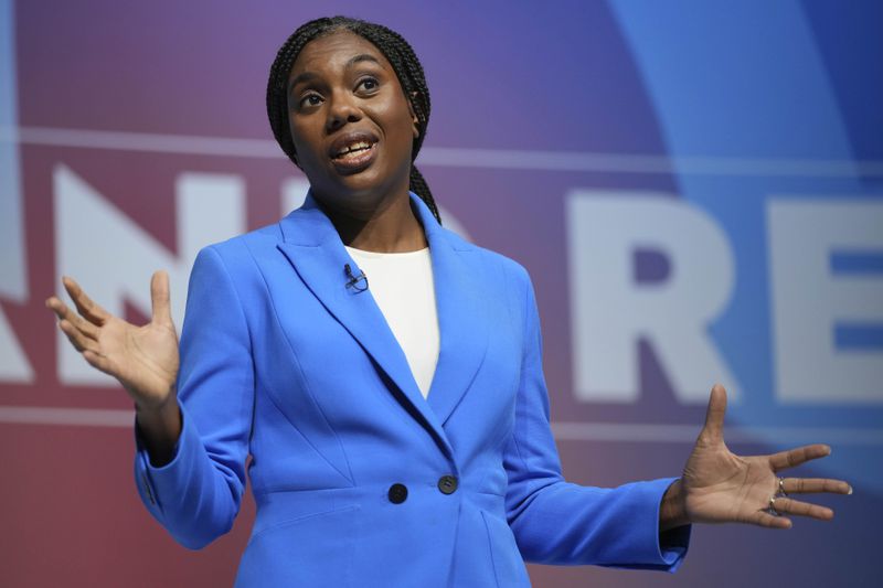 Conservative leadership candidate Kemi Badenoch addresses members during the Conservative Party Conference at the International Convention Centre in Birmingham, England, Wednesday, Oct. 2, 2024.(AP Photo/Kin Cheung)