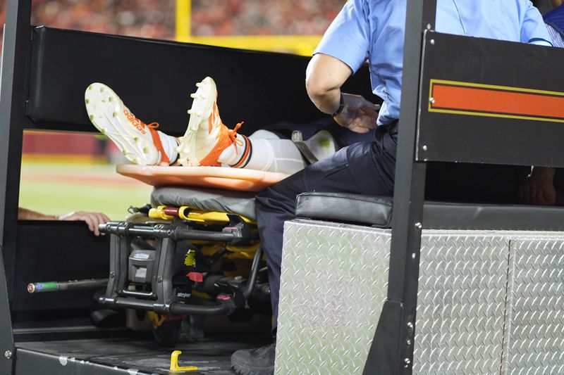 Chicago Bears defensive back Douglas Coleman III is taken off the field on a cart after being injured during the second half of an NFL preseason football game against the Kansas City Chiefs Thursday, Aug. 22, 2024, in Kansas City, Mo. (AP Photo/Charlie Riedel)