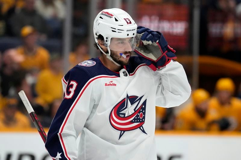 FILE - Columbus Blue Jackets' Johnny Gaudreau (13) plays against the Nashville Predators during the second period of an NHL hockey game, April 13, 2024, in Nashville, Tenn. (AP Photo/Mark Humphrey, File)