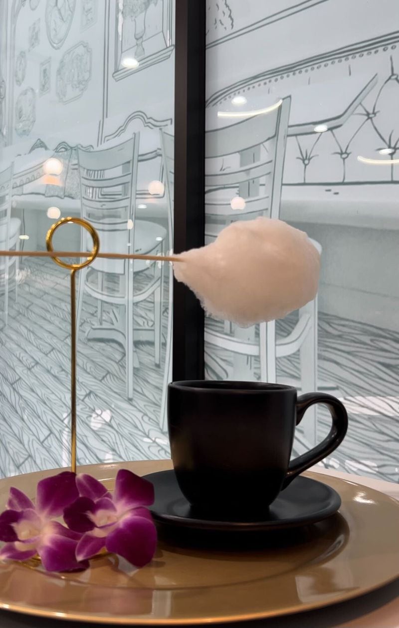 The Cloud Noir drink from Toast Noir includes a cotton candy cloud served over a cup of coffee. / Courtesy of Toast Noir
