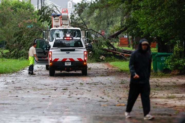 Georgia Power crews are seen working in a northside neighborhood in Valdosta, where dozens of fallen trees have cut power near Valdosta State University. This shows the aftermath of Tropical Storm Debby’s path through South Georgia on Monday, August 5, 2024.
(Miguel Martinez / AJC)