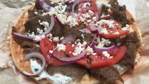 Yiayia’s Gyro Bites are among the appetizers on the menu at Athens Pizza. LIGAYA FIGUERAS / LIGAYA.FIGUERAS@AJC.COM