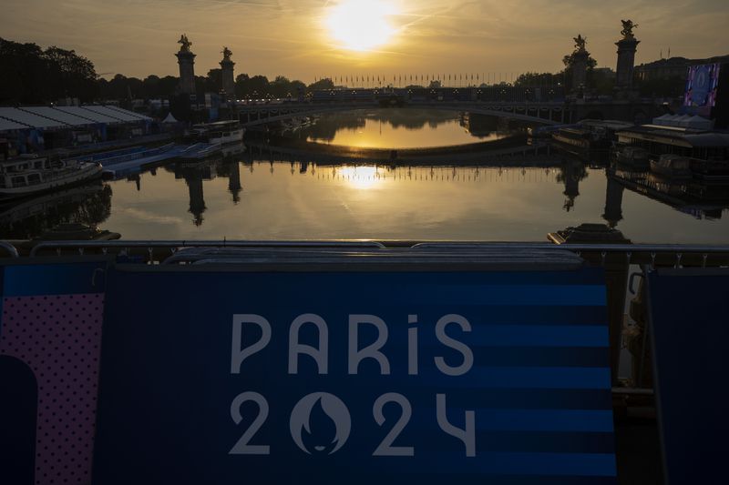 View of the Seine river where the triathlon competition has been cancelled, during the 2024 Paralympics, Sunday, Sept. 1, 2024, in Paris, France. (AP Photo/Emilio Morenatti)