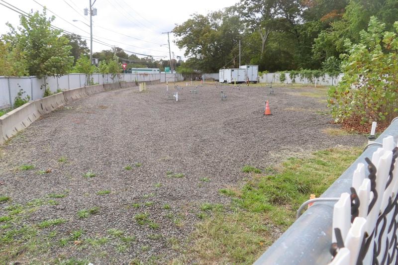 A polluted site in Wall Township, N.J. that could be disturbed by digging for an offshore wind power cable is fenced off on Sept. 30, 2024. (AP Photo/Wayne Parr