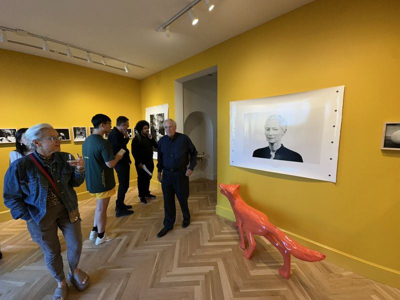 The opening reception that included the Michael Stipe art exhibit included photos of actress Tilda Swinton. RODNEY HO/rho@ajc.com