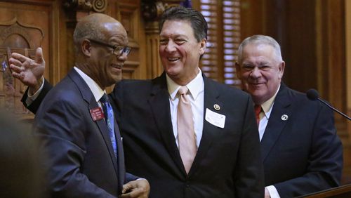 Jan. 14, 2016 -  Atlanta -  U.S. Rep. Lynn Westmoreland, who served in the Georgia House in 1993, was introduced by Rep. Calvin Smyre (left), D - Columbus, as a guest speaker, as Speaker of the House David Ralston looks on.   Westmoreland, who has announced he is not running for reelection to congress.   Activity in the House and Senate was mostly ceremonial today.  Deal administration officials (Chief of Staff Chris Riley and Office of Planning and Budget Director Theresa MacCartney) held a briefing on the FY17 budget and members of the Georgia House Democratic Caucus released it's  2016 legislative agenda.    BOB ANDRES  / BANDRES@AJC.COM