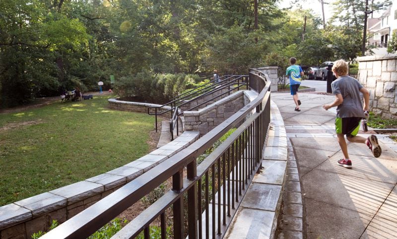 Orme Park in Virginia Highlands runs along Brookridge Drive and has a playground on one side of Clear Creek and a natural path on the other side. (Jenni Girtman/Atlanta Event Photography)