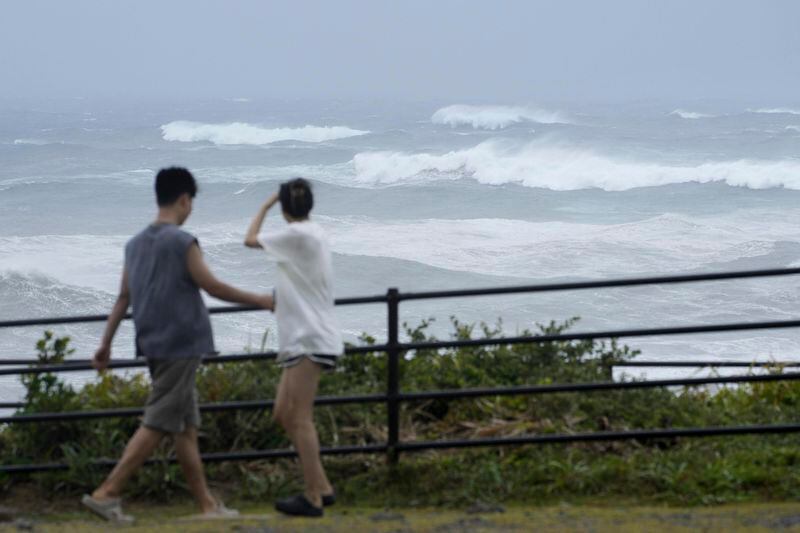 High waves hit a beach in Choshi, Chiba prefecture, east of Tokyo, as Typhoon Ampil moved past the area, Friday, Aug. 16, 2024. (Kyodo News via AP)