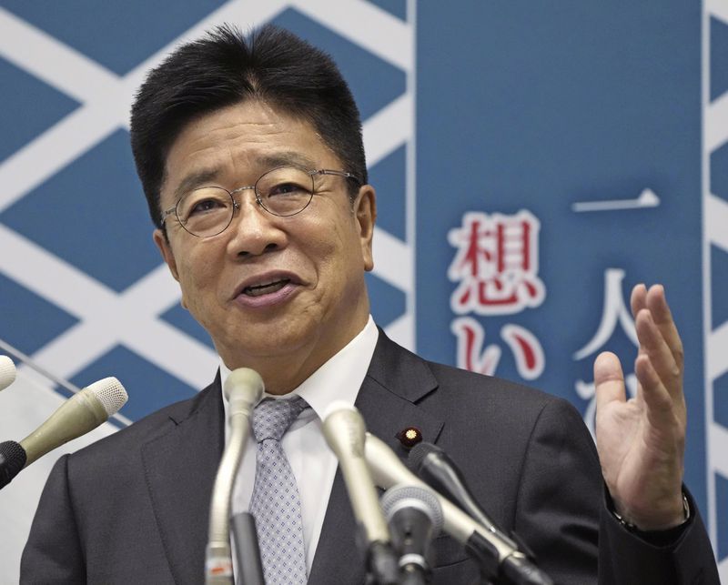 Japan's former Chief Cabinet Secretary Katsunobu Kato speaks during a press conference as he announces his candidacy of the Liberal Democratic Party's presidential election, at the parliament in Tokyo, on Sept. 10, 2024. (Kyodo News via AP)