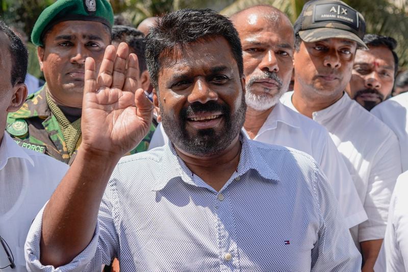 Leader and the presidential candidate of National People's Power Anura Kumara Dissanayake leaves a polling station after casting his vote in Colombo, Sri Lanka, Saturday, Sept. 21, 2024. (AP Photo/Eranga Jayawardena)