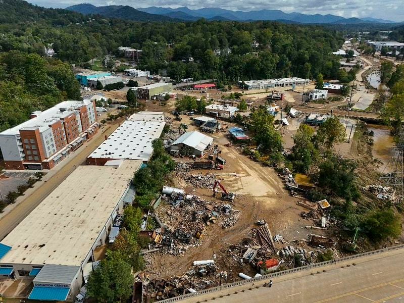 Debris is seen in the aftermath of Hurricane Helene, Monday, Sept. 30, 2024, in Asheville, N.C. (AP Photo/Mike Stewart)