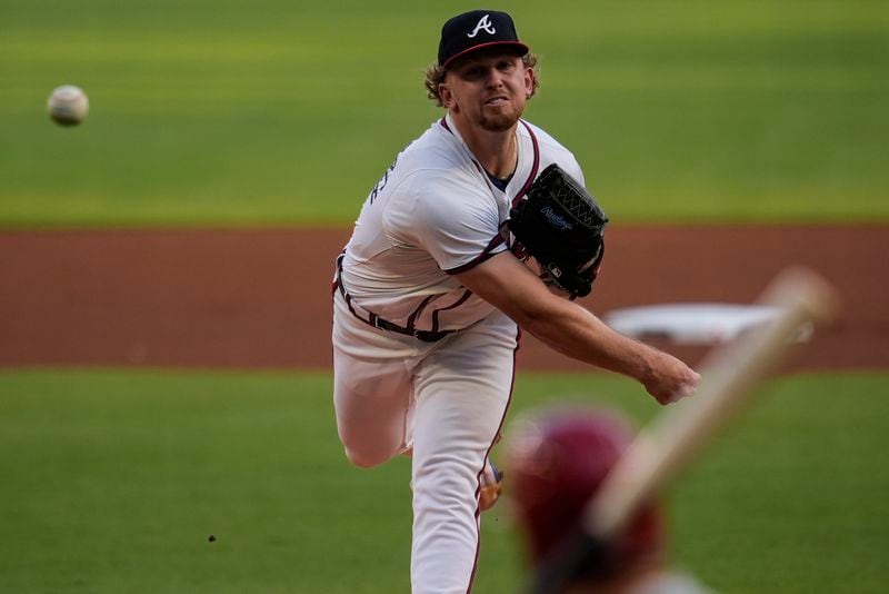 Atlanta Braves pitcher Spencer Schwellenbach (56) delivers against the Philadelphia Phillies in the first inning of a baseball game, Thursday, Aug. 22, 2024, in Atlanta. (AP Photo/Mike Stewart)