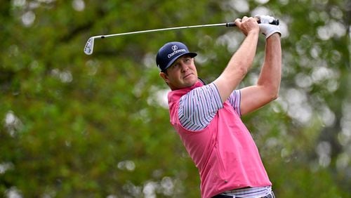 Hudson Swafford tees off on the fourth hole during the first round of the Masters on April 7. (Hyosub Shin / Hyosub.Shin@ajc.com)