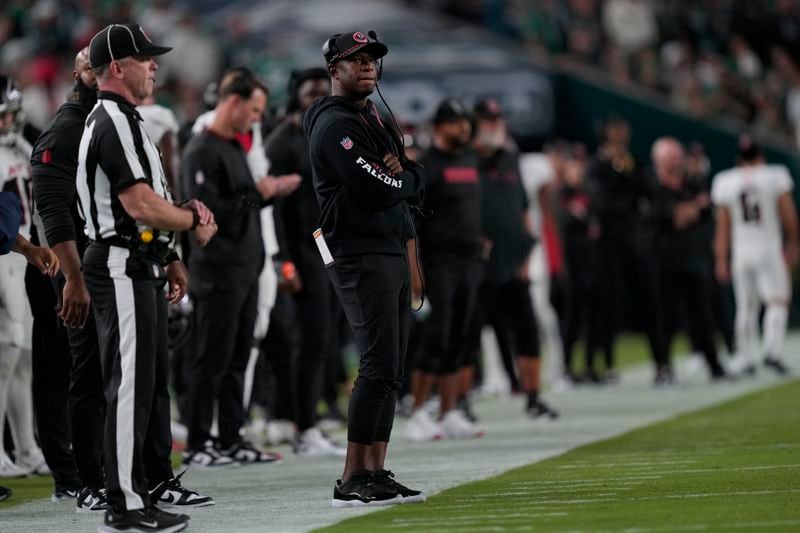 Atlanta Falcons head coach Raheem Morris watches action during the first half of an NFL football game against the Philadelphia Eagles on Monday, Sept. 16, 2024, in Philadelphia. (AP Photo/Matt Rourke)