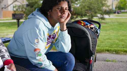 Ivanni Herrera looks on during an interview in a park Friday, May 18, 2024, in Aurora, Colo. (AP Photo/Jack Dempsey)