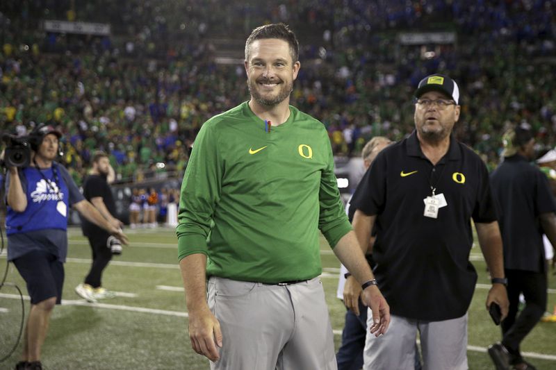 Oregon head coach Dan Lanning smiles after a win over Boise State in an NCAA college football game, Saturday, Sept. 7, 2024, at Autzen Stadium in Eugene, Ore. (AP Photo/Lydia Ely)