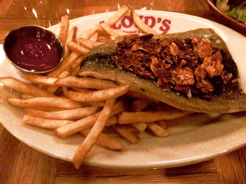 A daily blue-plate special at LLoyd’s Restaurant and Lounge might include a delicious trout amandine, shown here with fries. CONTRIBUTED BY WENDELL BROCK