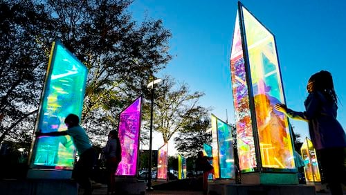 The traveling outdoor exhibit "Prismatica in the Park" (shown here while on view in Columbia, Maryland) is now at Woodruff Park downtown. It's free and open to the public through March 17.