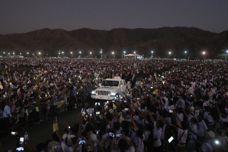 Pope Francis leaves after leading a holy mass at Tasitolu park in Dili, East Timor, Tuesday, Sept. 10, 2024. (AP Photo/Firdia Lisnawati)