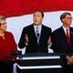 Brian Jack, center, a former aide to Donald Trump and now the Republican nominee in Georgia's 3rd Congressional District, speaks Monday at Fiserv Forum, where the Republican National Convention is being held in Milwaukee. He is flanked by Julianne Murray and Jeff Kent. (Arvin Temkar / AJC)