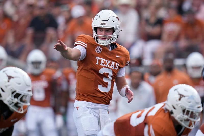 Texas quarterback Quinn Ewers (3) signals during the first half of an NCAA college football game against UTSA in Austin, Texas, Saturday, Sept. 14, 2024. (AP Photo/Eric Gay)