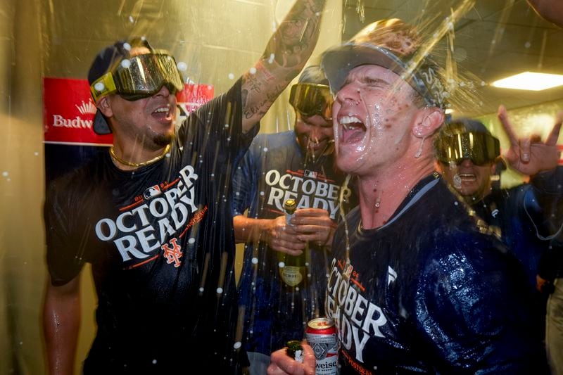 New York Mets' Pete Alonso celebrates with teammates after winning Game 3 of a National League wild card baseball game against the Milwaukee Brewers Thursday, Oct. 3, 2024, in Milwaukee. The Mets won 4-2. (AP Photo/Morry Gash)