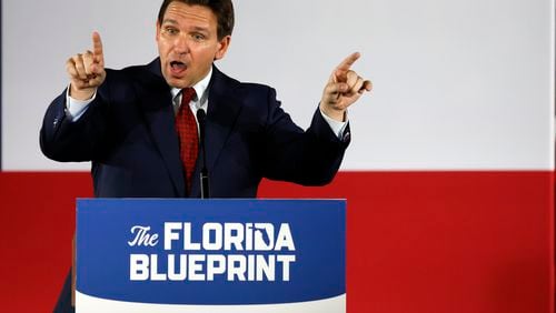 Florida Gov. Ron DeSantis speaks Thursday during an event spotlighting his newly released book, "The Courage To Be Free: Florida's Blueprint For America's Revival," at the Adventures Outdoors gun store in Smyrna. About 650 people were in attendance to hear the potential presidential candidate speak. Miguel Martinez / miguel.martinezjimenez@ajc.com