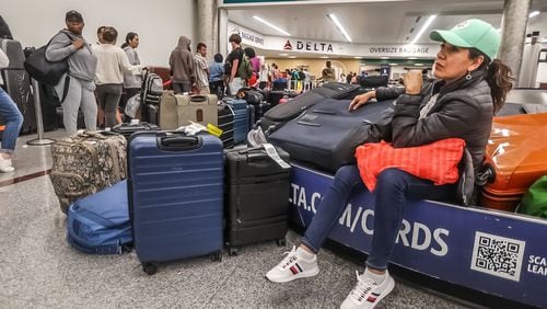 As of Monday morning, Atlanta-based Delta has canceled more than 5,000 Delta and Delta Connection flights since the initial global technology outage early Friday morning.  -- Text by Kelly Yamanouchi/AJC. Photos by John Spink/AJC.