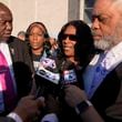 RowVaughn Wells, second from right, mother of Tyre Nichols, speaks during a news conference outside the federal courthouse after three former Memphis police officers were convicted of witness tampering charges in the 2023 fatal beating of Nichols, Thursday, Oct. 3, 2024, in Memphis, Tenn. (AP Photo/George Walker IV)