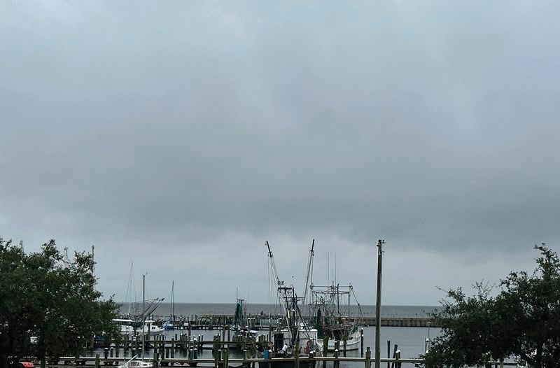 Boats leaving Pass Christian Harbor after mandatory evacuation issued Tuesday, Sept. 10, 2024 in Pass Christian, Miss., due to Tropical Storm Francine. (Hunter Dawkins/The Gazebo Gazette via AP)