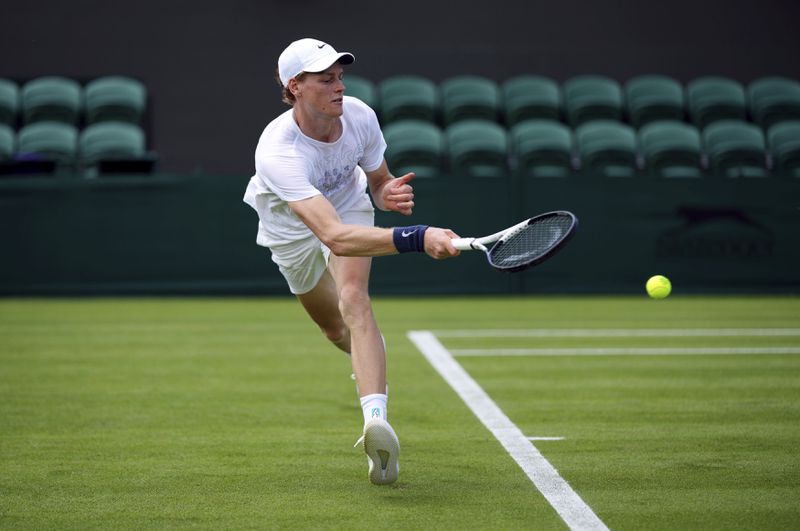 Italy's Jannik Sinner practices at the All England Lawn Tennis and Croquet Club in Wimbledon ahead of the Wimbledon Championships, scheduled to begin on July, Wednesday June 26, 2024. (John Walton/PA via AP)